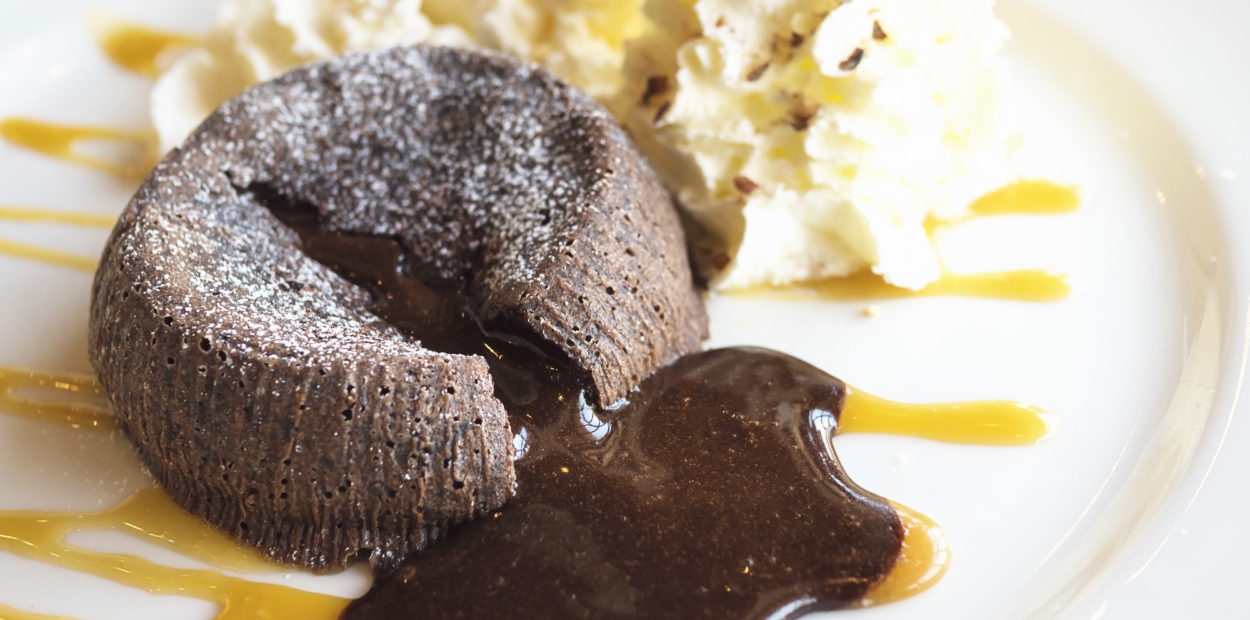 Chocolate lava cake in white plate