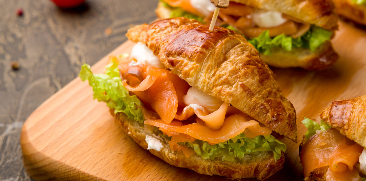 mini croissant with salmon and cheese with mix salad, canapes